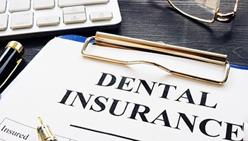 Close-up of dental insurance form on a clipboard
