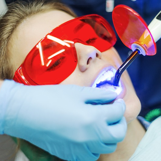 Patient receiving cosmetic dental bonding