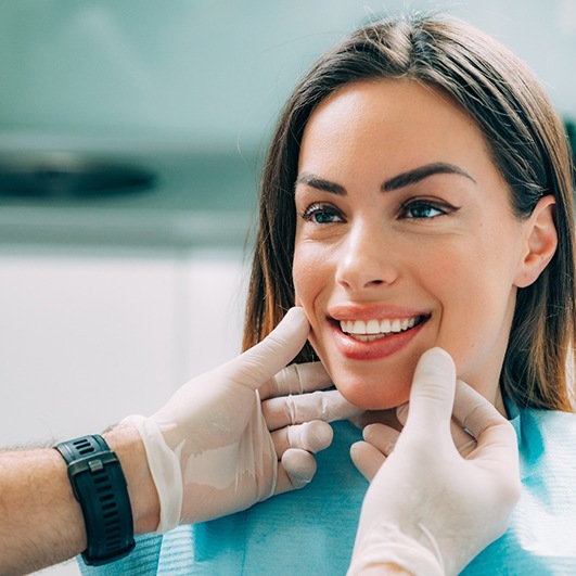 patient smiling after the cost of cosmetic dentistry in Barnegat