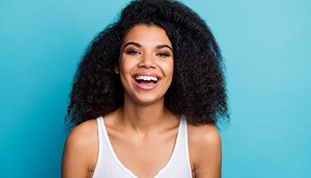 woman smiling about the cost of cosmetic dentistry in Barnegat