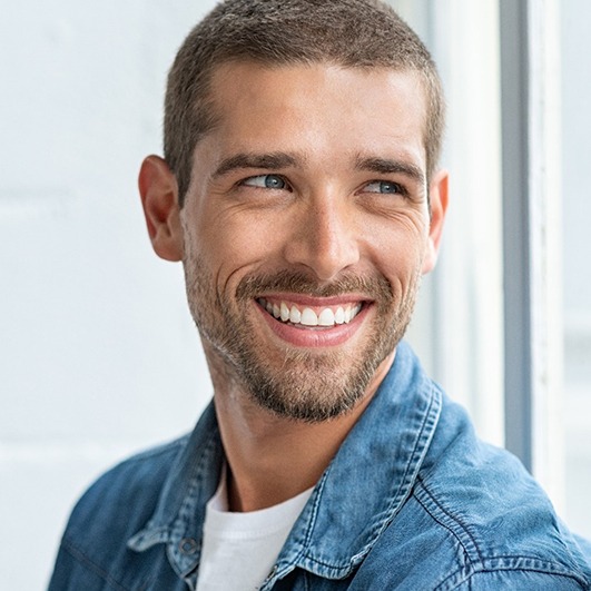 a man smiling after visiting cosmetic dentist in Barnegat