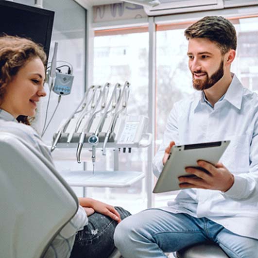 Woman at dentist for dental crown in Barnegat