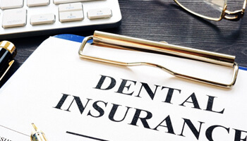 close-up of dental insurance form on a clipboard