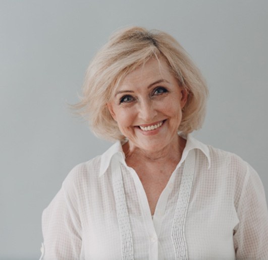 Woman smiling with dentures