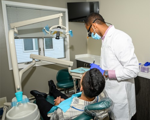 photo of Dr. Gizachew & Patient