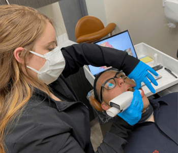 dental assistant and patient
