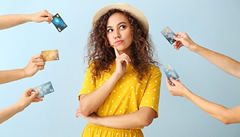 Woman surrounded by credit cards