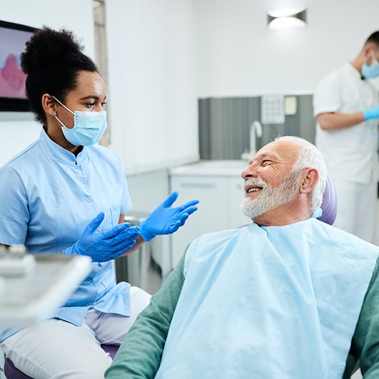 Man smiling in dental chair