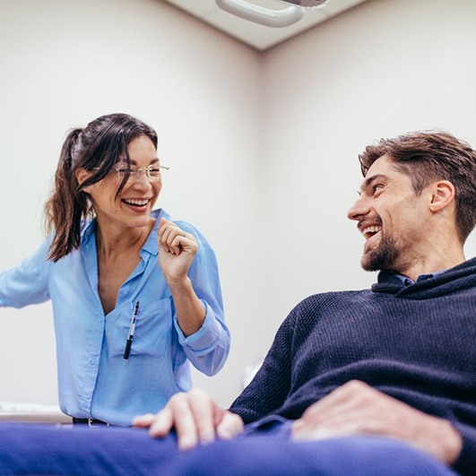 patient asking about dental implants in Barnegat 