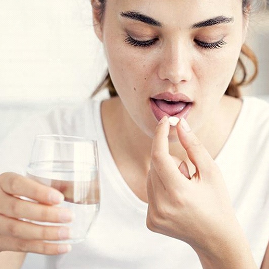 Woman taking oral conscious sedation in Barnegat 