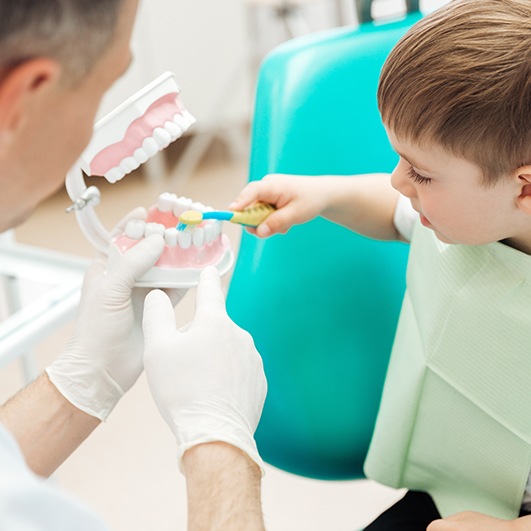 Child in Barnegat smiling after receiving dental sealants