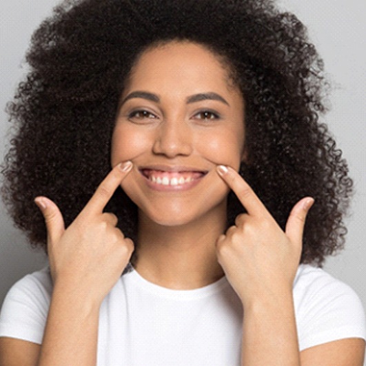 woman smiling after getting teeth whitening in Barnegat