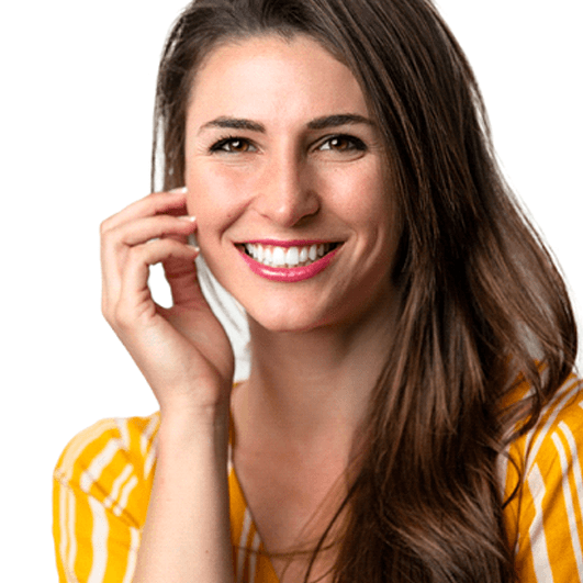 a woman smiling after teeth whitening in Barnegat