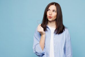Woman wondering if she can get Invisalign with her dental restoration