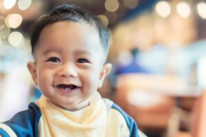 Smiling toddler.